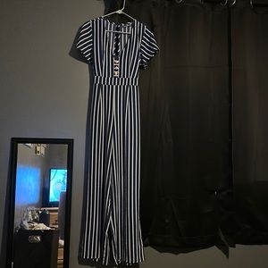 Blue and white jumpsuit. Size 9